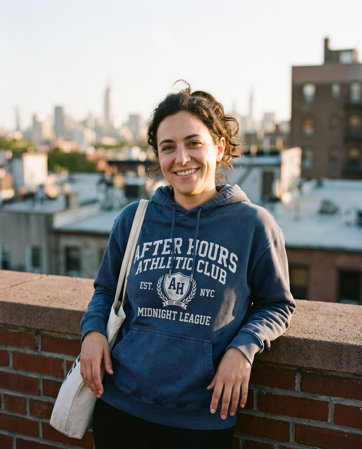 Customer wearing the After Hours Collegiate Hoodie
